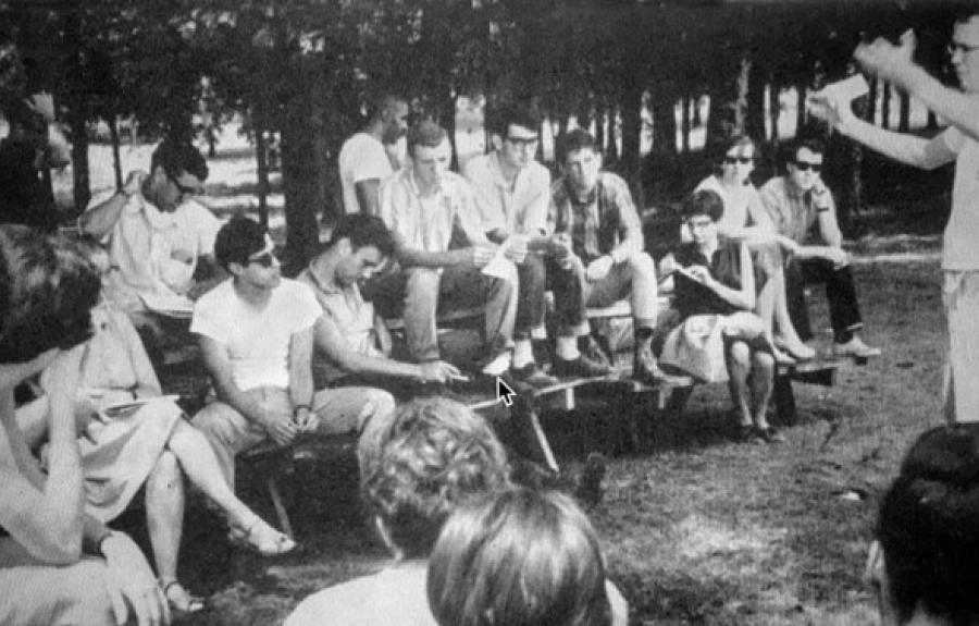Cornell students gather at a park in Fayette County, Tennessee, in 1964 to discuss voter registration for Black citizens.