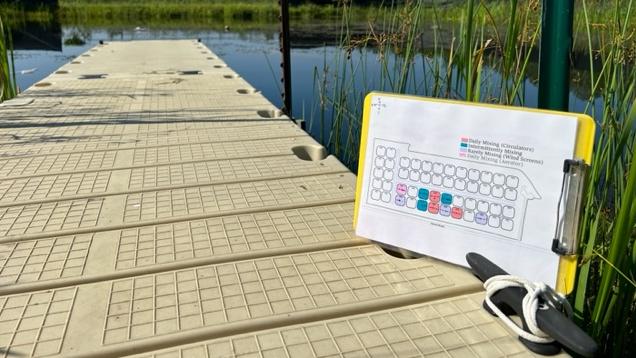 Cornell Experimental Ponds dock by Christine Bogdanowicz 2024.