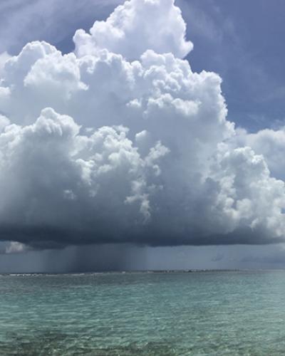 A tropical storm viewed over the ocean